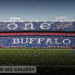Bills fans welcome Pegula era with enormous sign, t-shirts