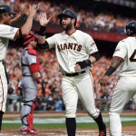 Cards error in 10th helps Giants to Game 3 win