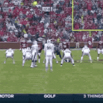 Kansas State got an interception after a Kansas player kicked the ball (Video)