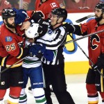 Flames pull away from Canucks, lead series 2-1