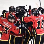 Flames win, avoid 3-0 hole